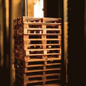 wooden pallets in the warehouse of the company - City Profit client